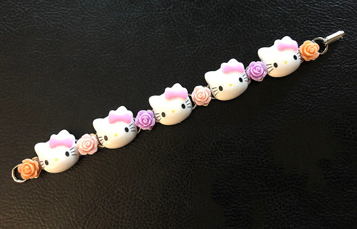 Hello Kitty charm bracelet handmade on a 7.5 - Depop